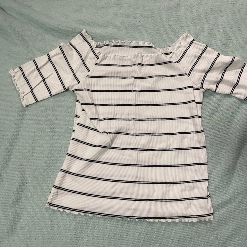 White crop top with black stripes. Used.